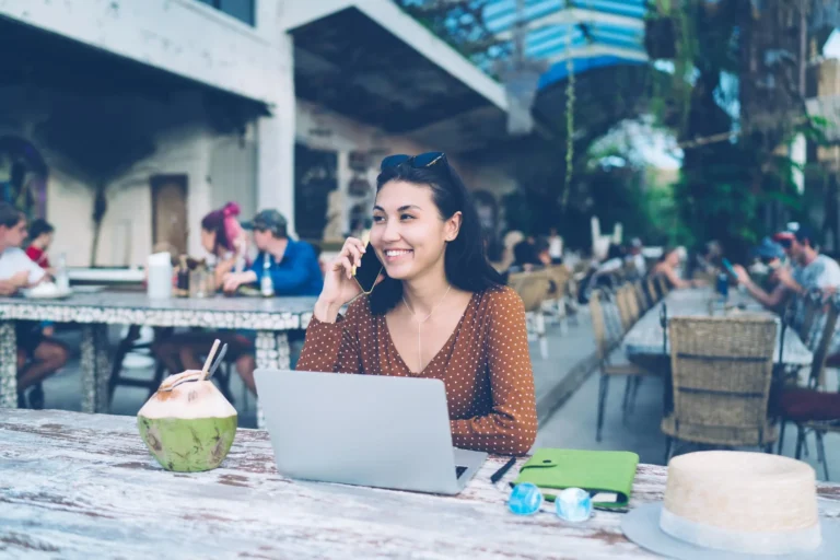 depositphotos 418060978 stock photo positive asian female laptop talking