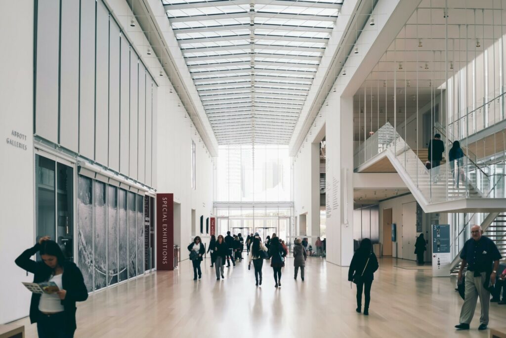 People walking through an office building